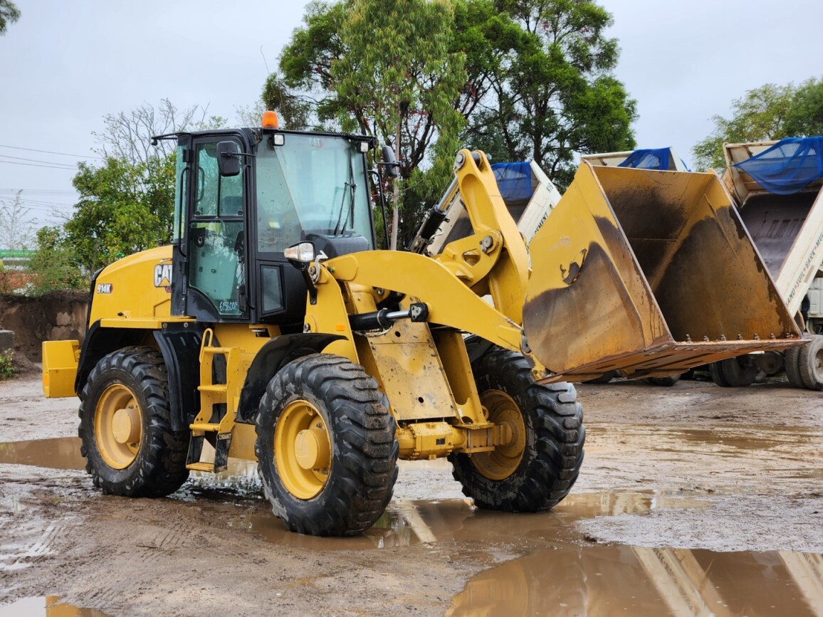 View articulated front end loader available via auction.