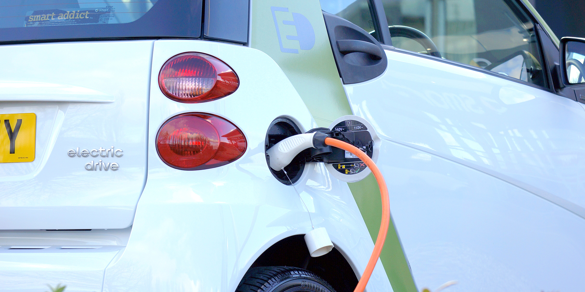 What differentiates between electric, plug-in, and hybrid vehicles?