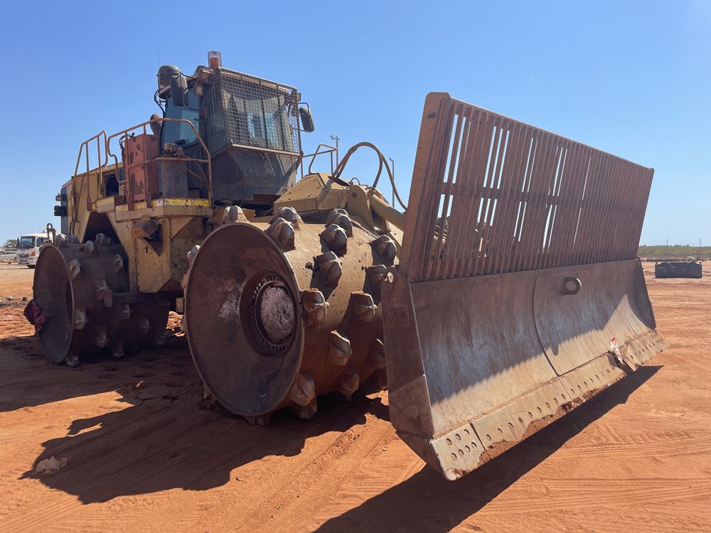 View a red 2013 Caterpillar 836K available via auction.