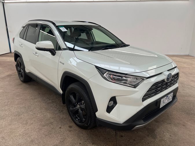 Explore a white 2021 Toyota RAV4 Cruiser Hybrid & more at our upcoming auction.
