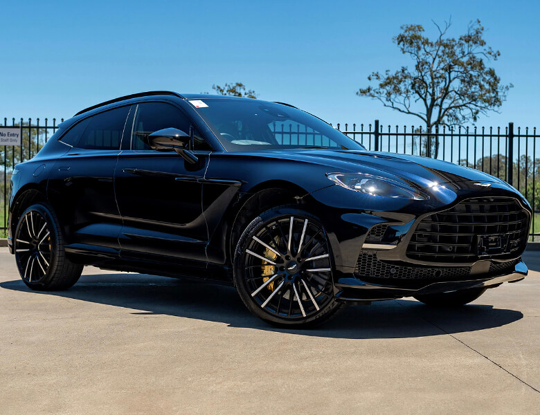 View black 2023 Aston Martin DBX sold car at our previous auction.