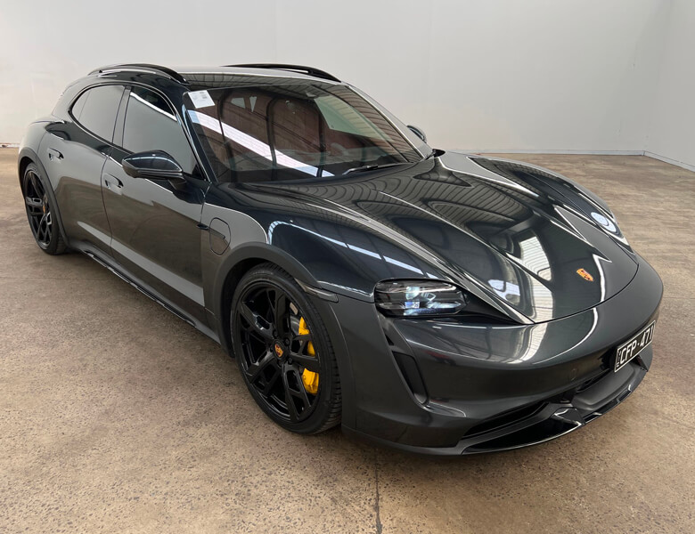 View black 2022 Porsche Taycan sold car at our previous auction.