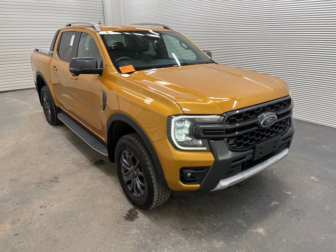 View an orange 2022 Ford Ranger Wildtrak available via auction.