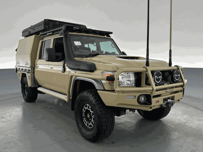 View beige Toyota Landcruiser 79 Series GXL available via auction.