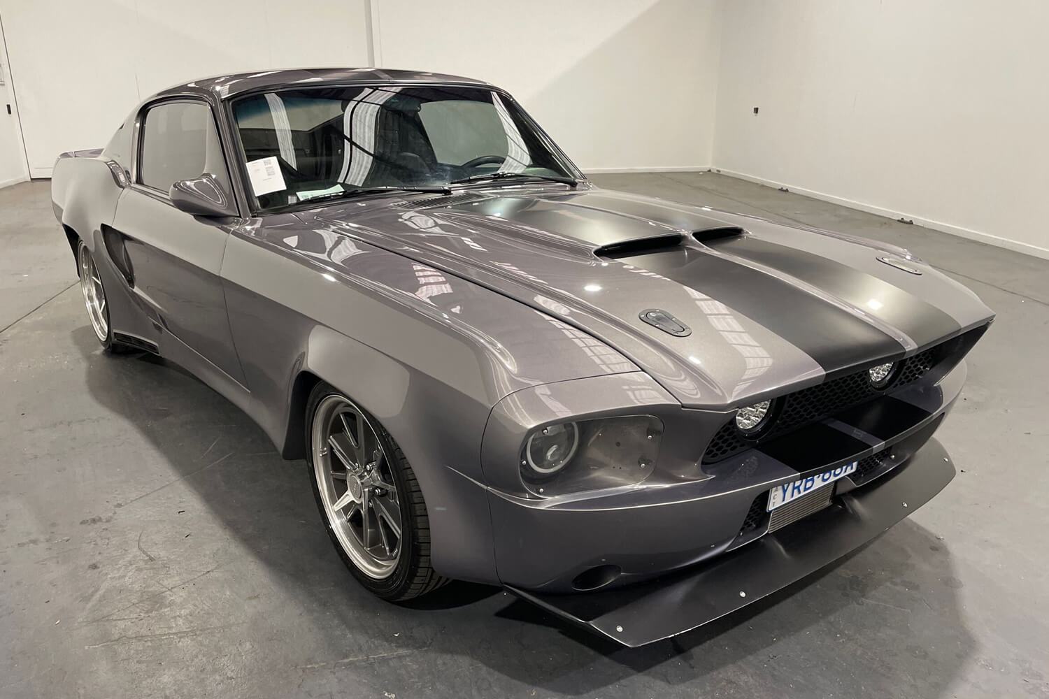 View a grey 1968 Ford Mustang The Quicksilver Resto-Mod available via auction.