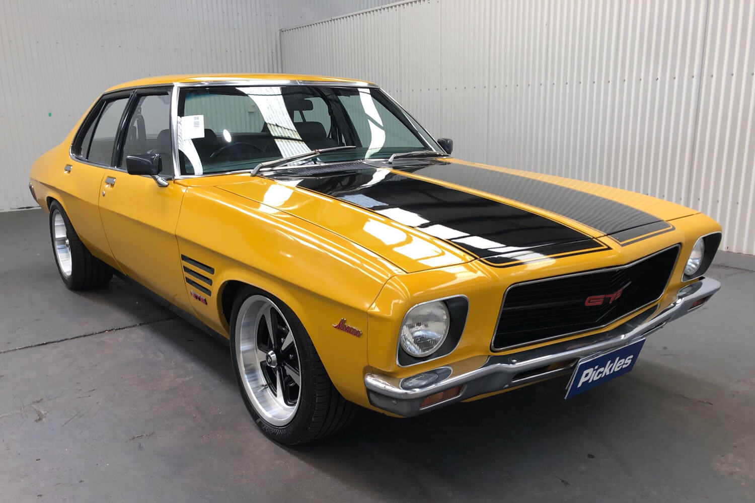 View a yellow 1973 Holden Monaro HQ GTS available via auction.