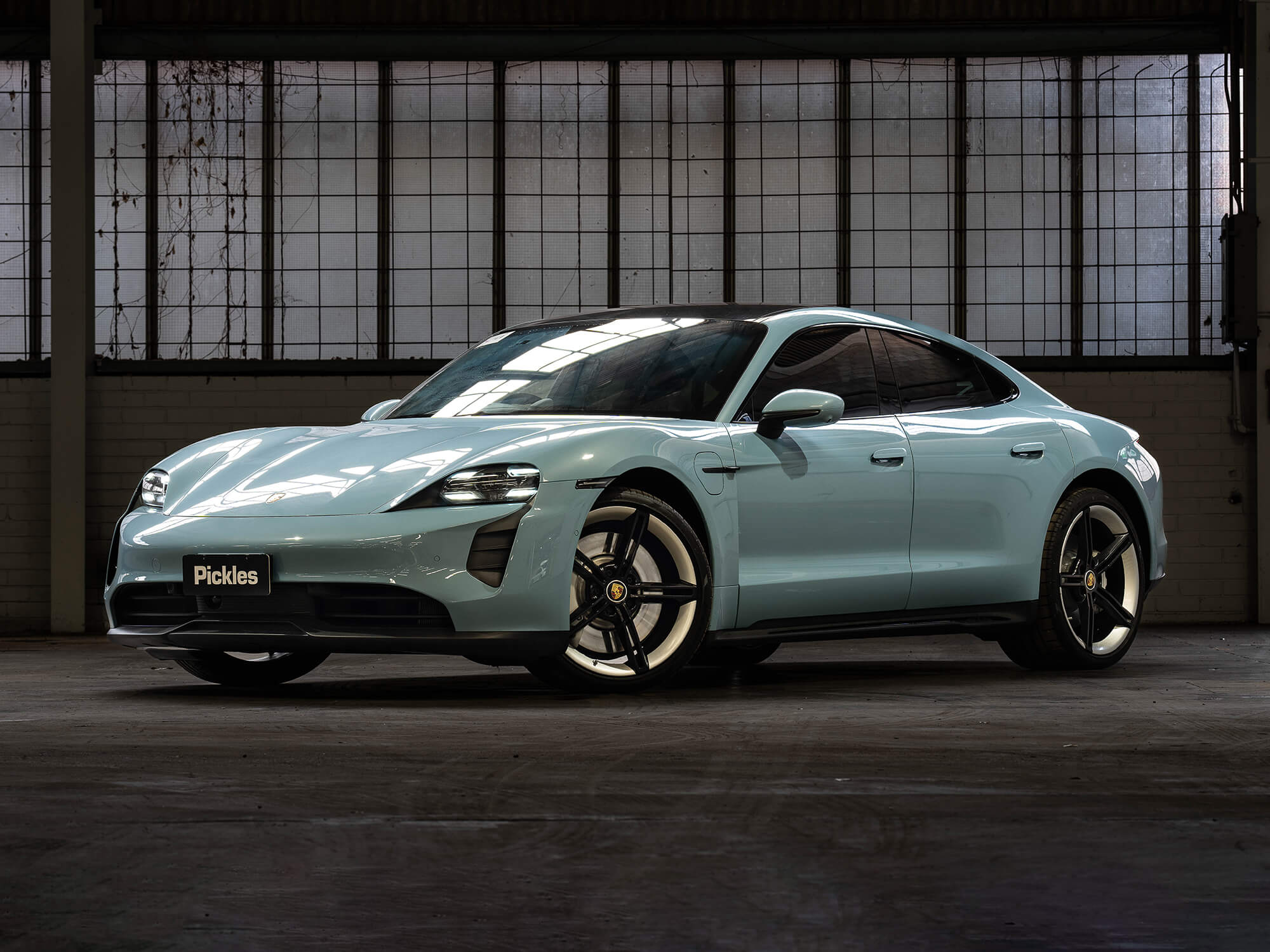 View a blue 2023 Porsche Taycan GTS available via auction.