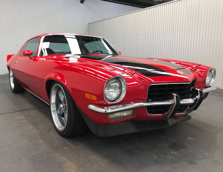 View red and black 1973 Chevrolet Camaro S sold car at our previous auction.