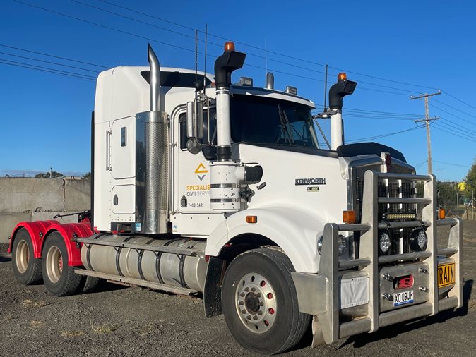 View a white 2010 Kenworth T408SAR available via auction.