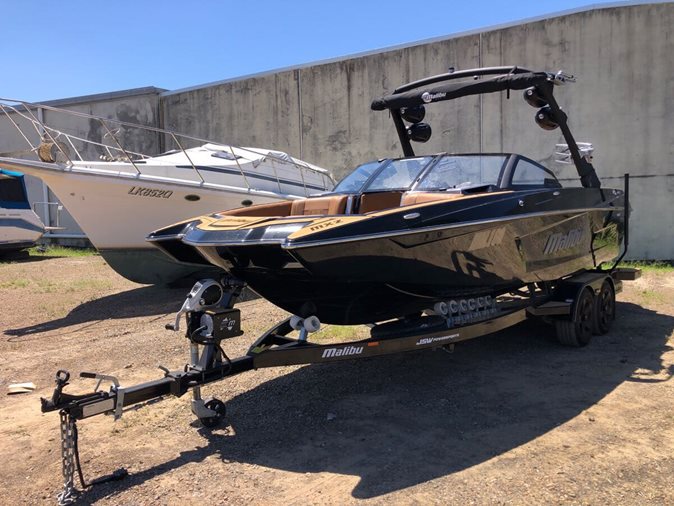 View a black 2022 Malibu Wakesetter 23 MXZ Sports up for sale at our upcoming auction.