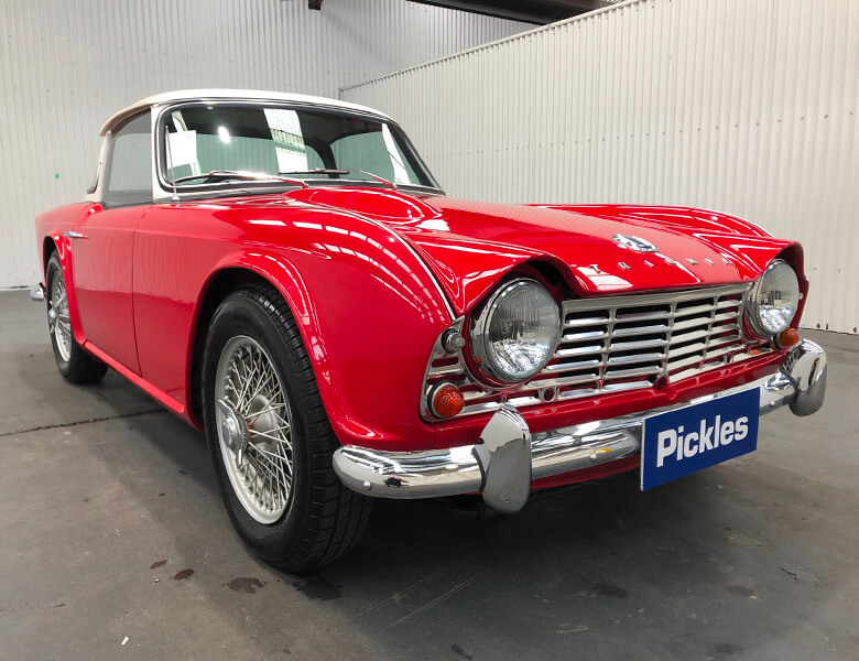 View red 1963 Triumph TR4 sold car at our previous auction.